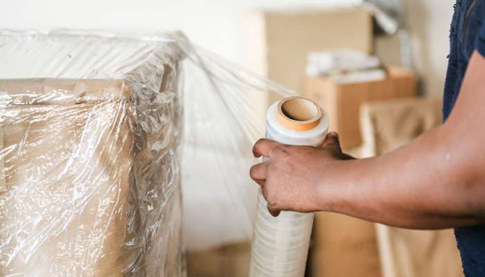 Young Man Working warehouse with boxes 1